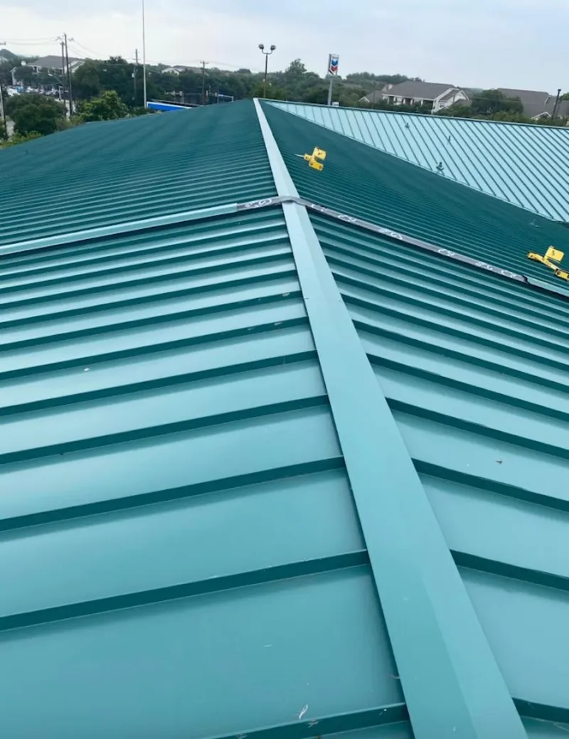Green commercial metal roof ridge and valley for Metal Roof Repair in Granger