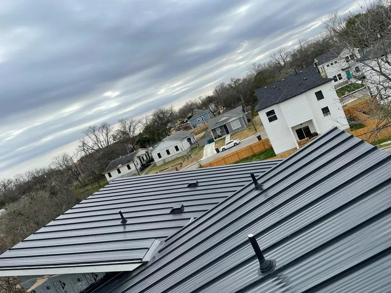 Standing seam metal roof panels with vents for Skylight Repair in Granger